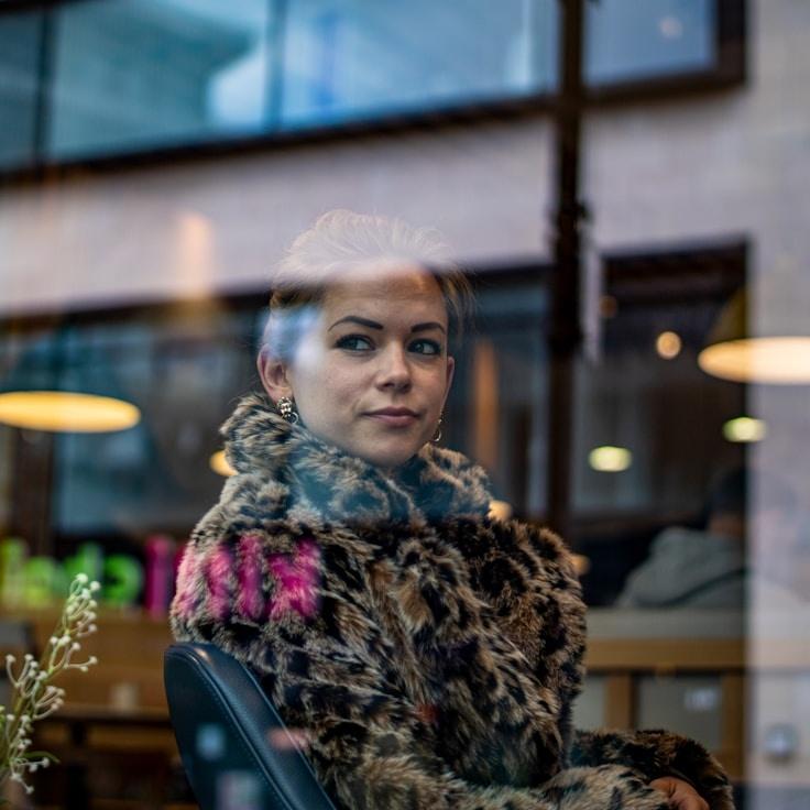 Riya Kapoor, Client Relations Director, discussing corporate gifting strategy with business clients